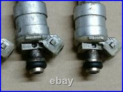4 X Bosch Grey Injectors 0280 150403 (0521)